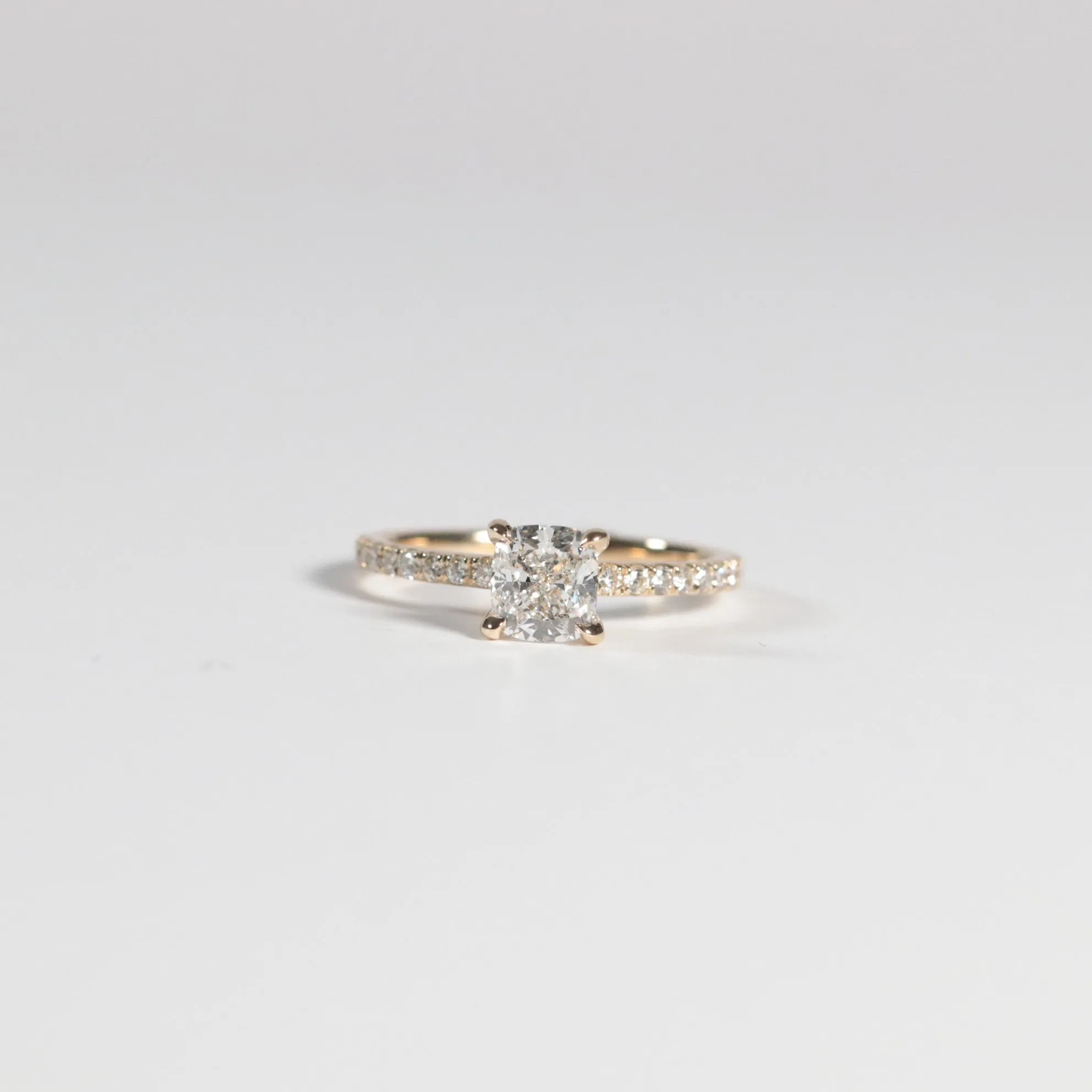 0.90 Cushion Solitaire with Accented Band and Hidden Halo