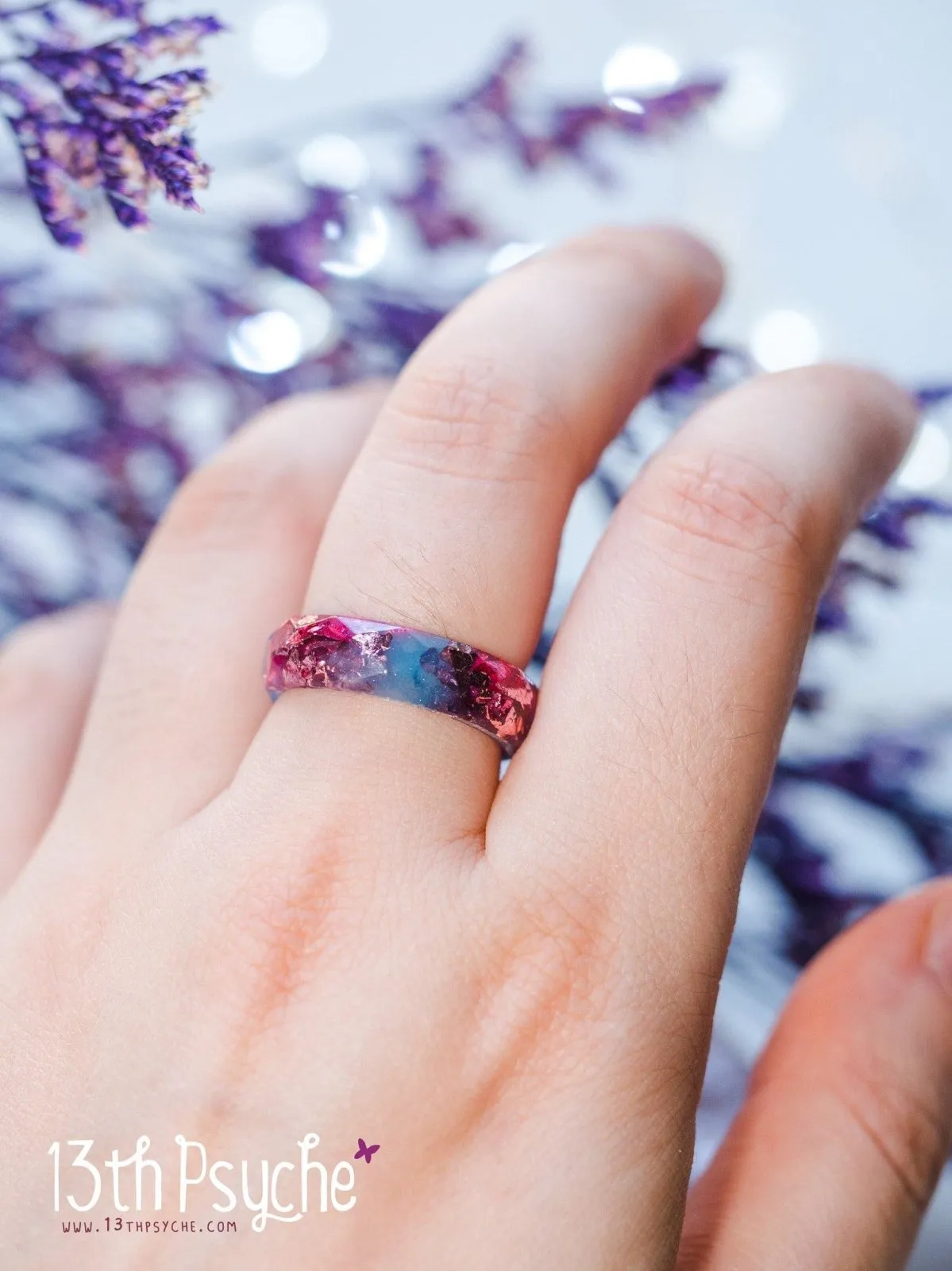 Blue and fuschia faceted resin ring with pink metallic flakes