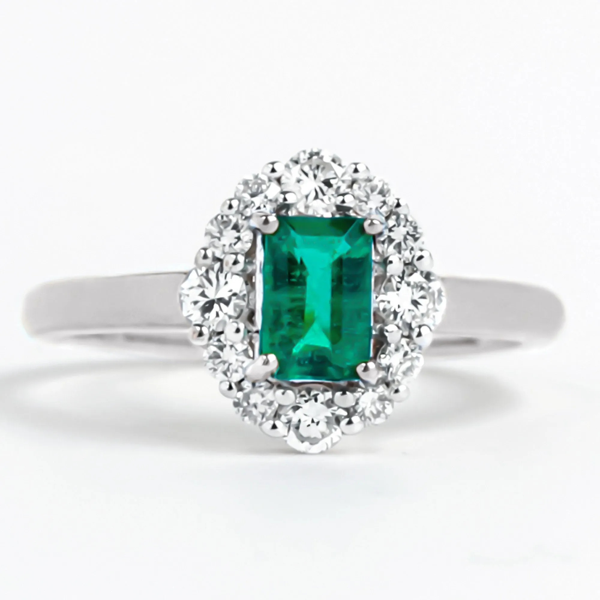 Octagon Cut Emerald Engagement Ring with Diamond Halo