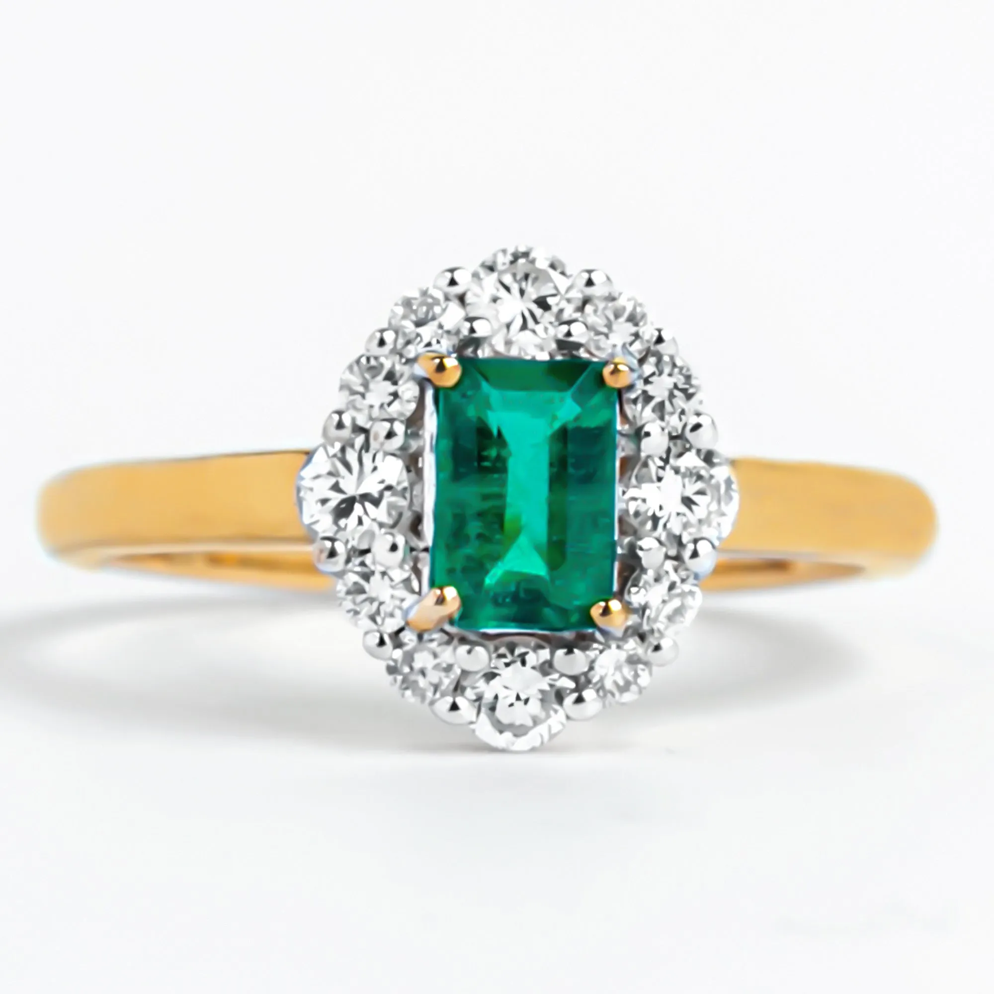 Octagon Cut Emerald Engagement Ring with Diamond Halo